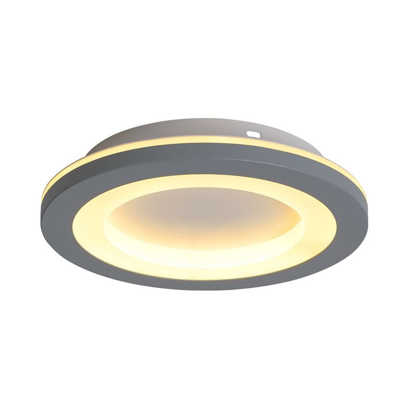 Close circular gray border around a yellow-lit ring and pale inset center