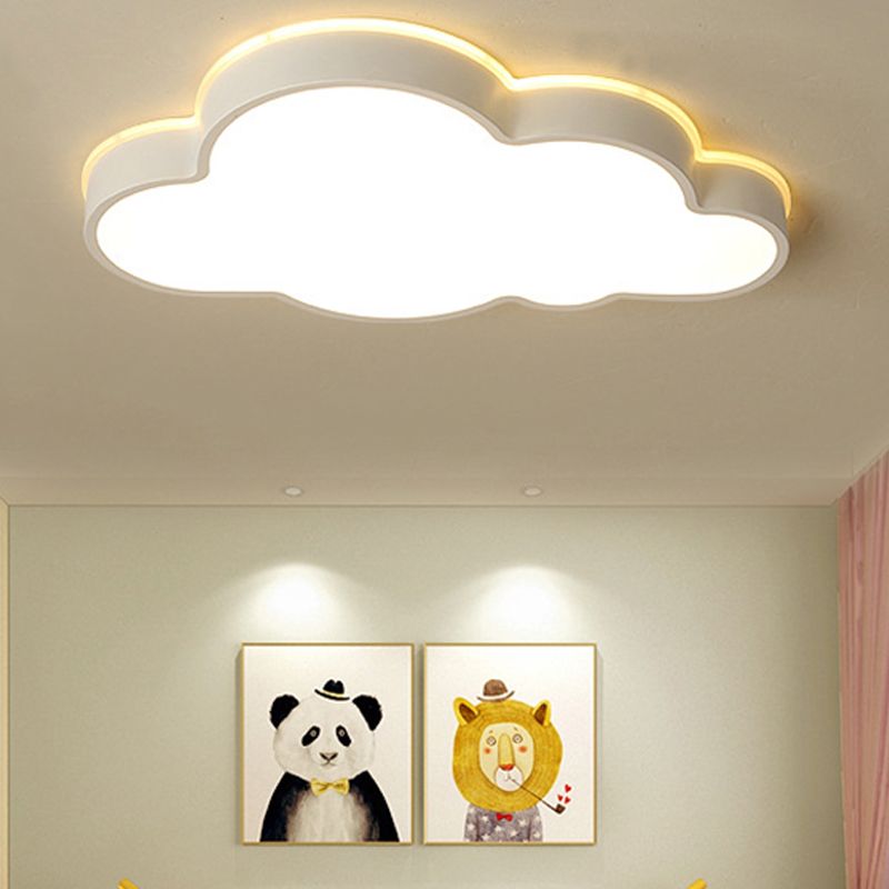 Lit Minori cloud above framed panda and lion pictures on a pale green wall beside a pink curtain.