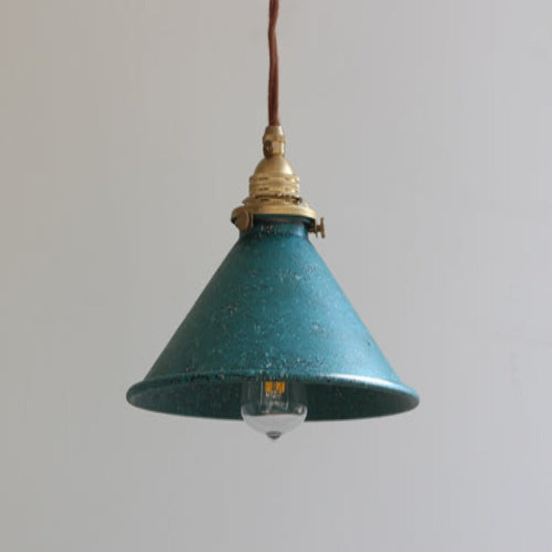 Another hanging view of the blue-toned Alessio cone, with mottled finish and a visible clear bulb below the shade rim.