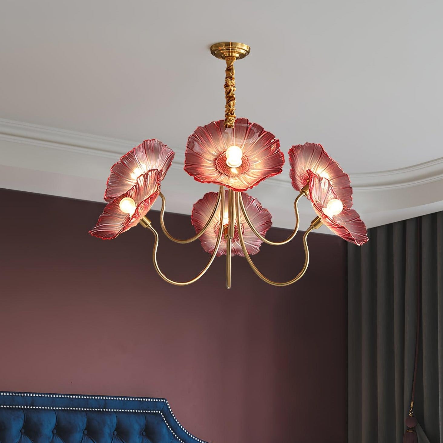 Pink flower chandelier near pink wall