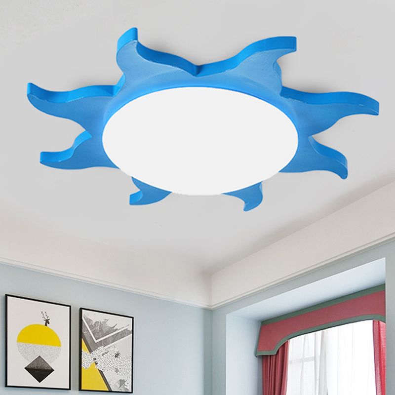 Blue Freja sun light pictured near framed artwork