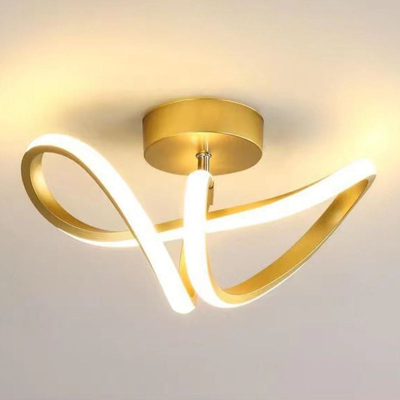 Gold Lacey ceiling light showing its crossing curves and circular canopy