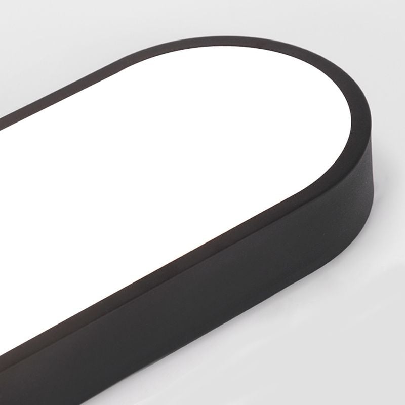 Close view of a black Quinn rounded end showing a smooth sidewall and filled pale lower light face.