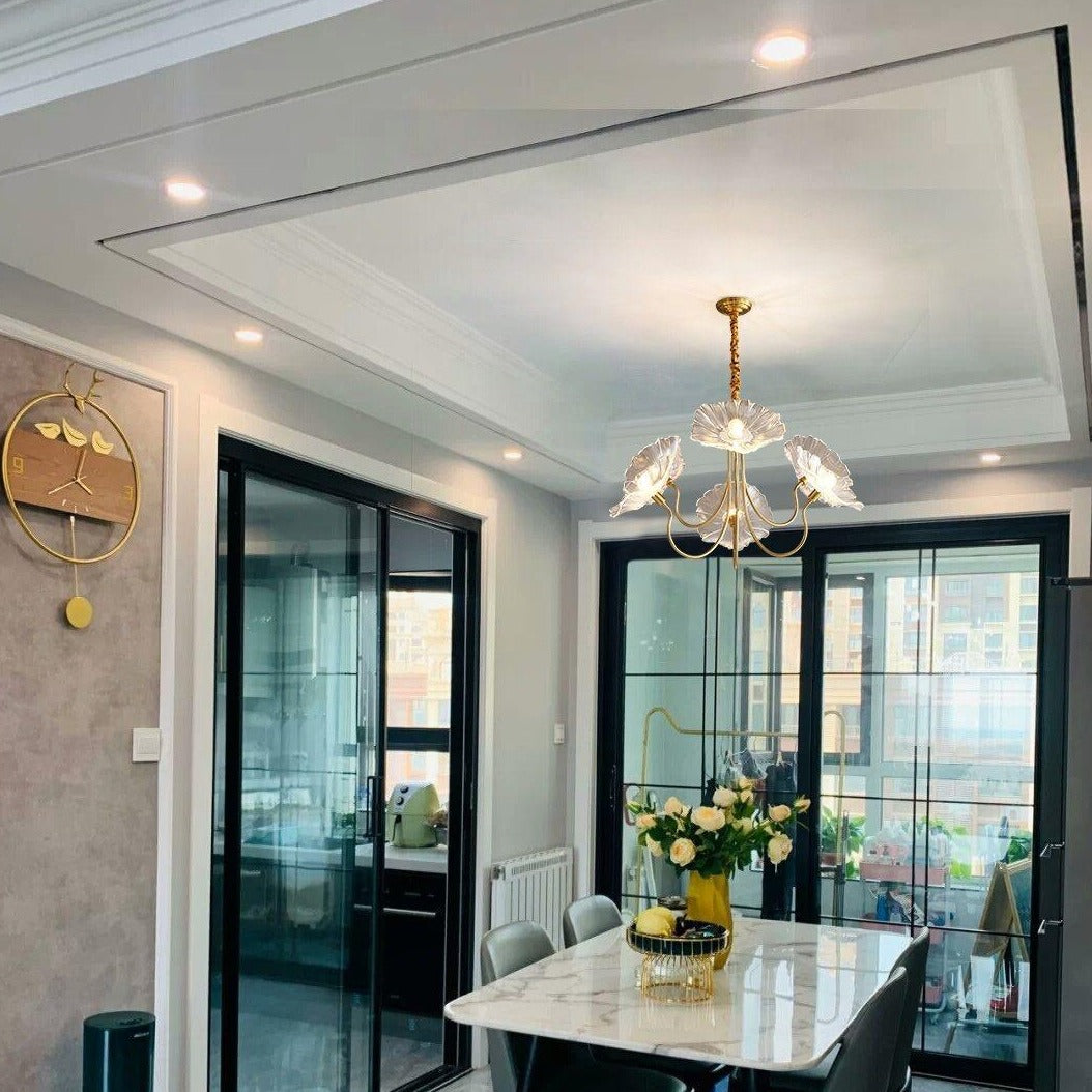 Clear flower chandelier above dining table