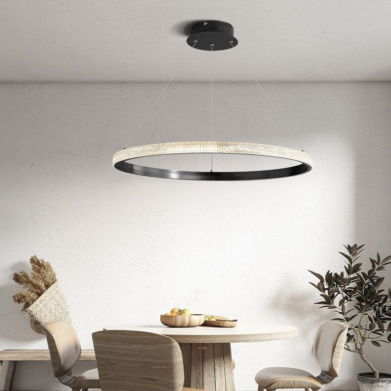 Kirsten black single ring above a round dining table