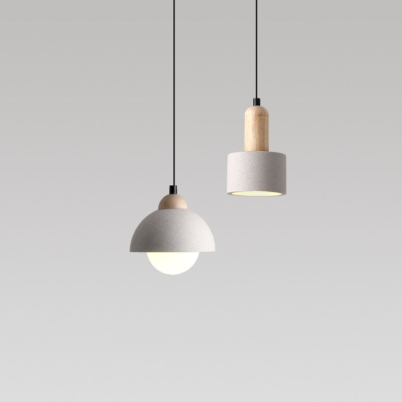 Ozawa dome and cylindrical pendants shown together with pale wood upper details.