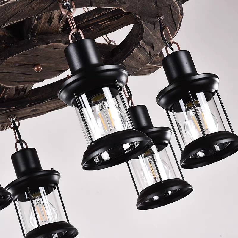 Close view of Austin black metal lantern fittings and clear glass cylinders