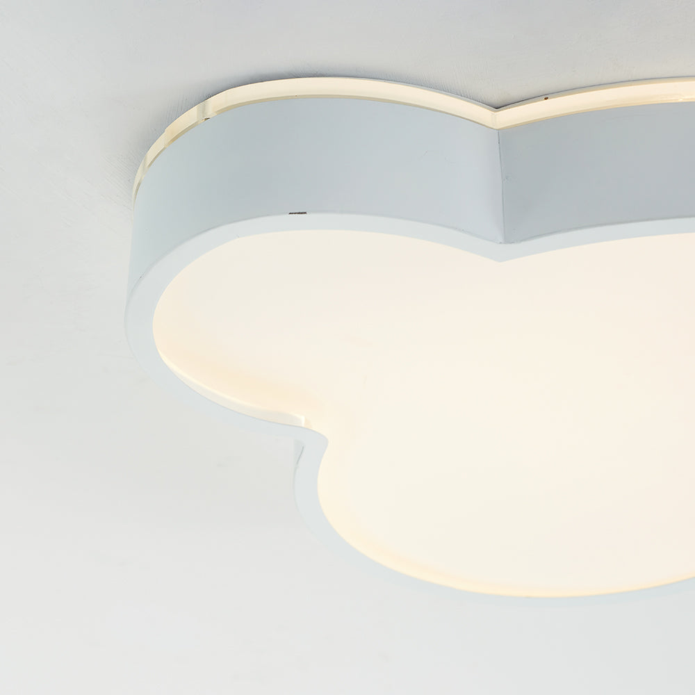 Minori detail showing the curved white sidewall, pale glowing diffuser face and narrow illuminated line along the top edge.