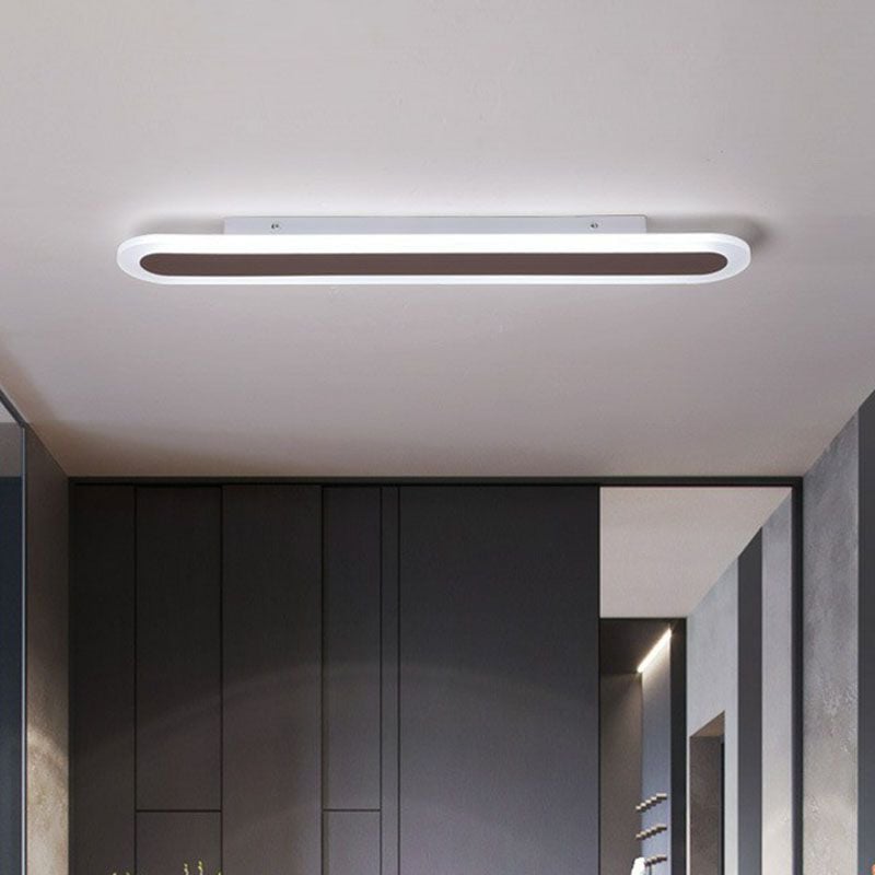 Edge linear fixture with a dark centre above a gray interior