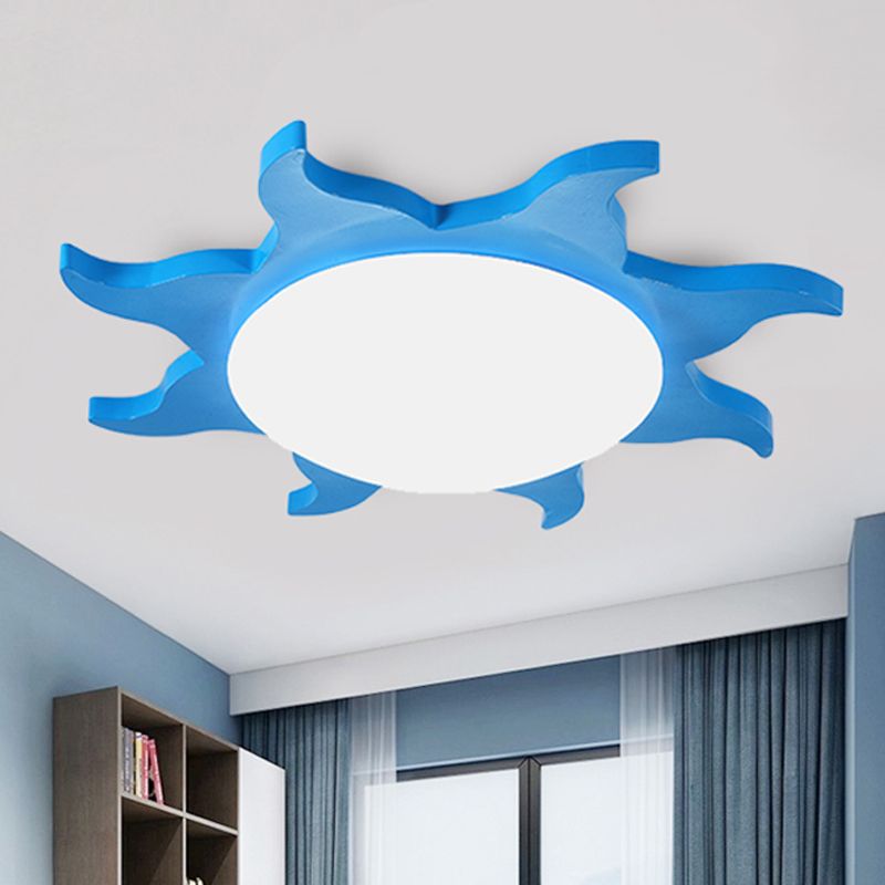 Blue Freja sun light above a room with blue curtains