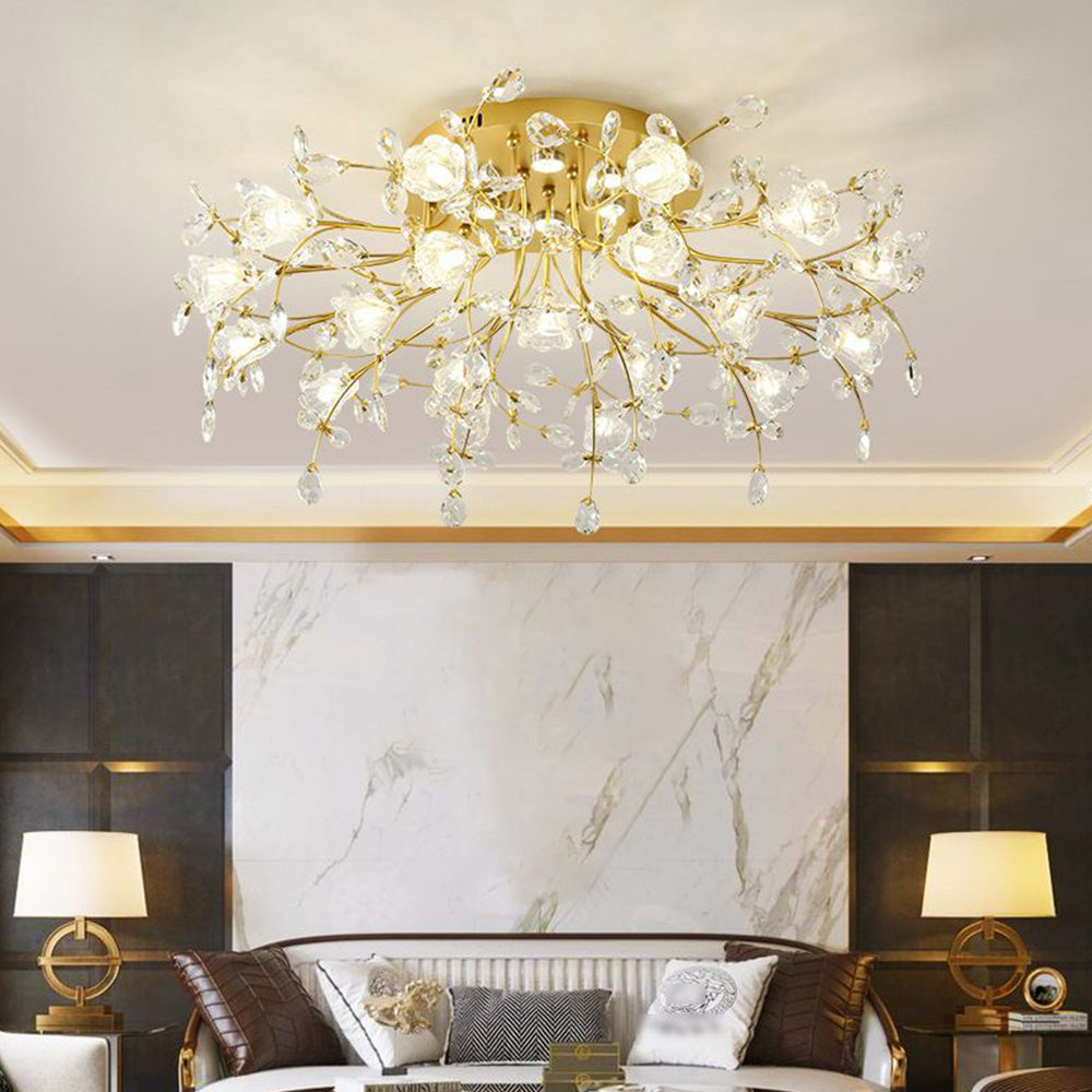 Lili floral ceiling fixture above a pale sofa, with a marble-pattern wall, dark panels and separate gold-ring table lamps below.