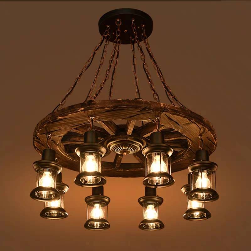 Austin wheel pendant with glowing glass lanterns beneath the wooden rim.