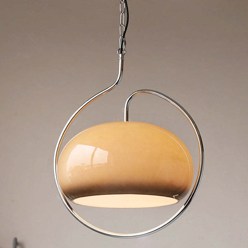 Front view of brown glass Hailie pendant lit beneath