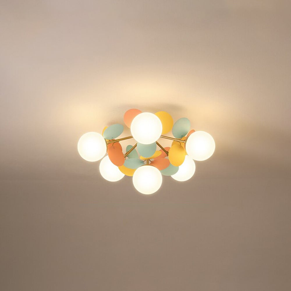 Jevon Color 21.6-inch 6-light option seen from below, with white globes, gold-tone branches and colourful petals.