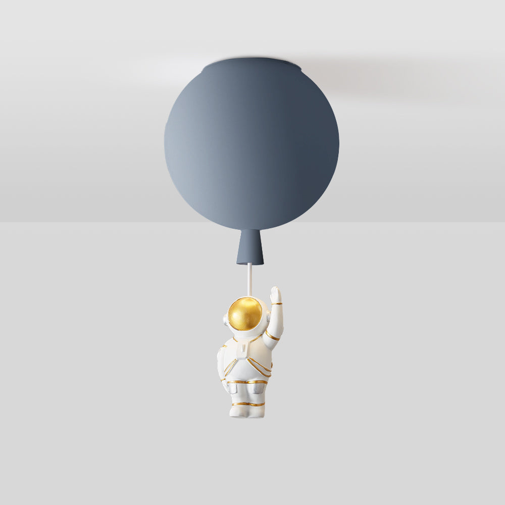 Grey balloon globe above a one-arm-up white astronaut with gold-tone visor and silver-tone lower-body details, joined by a pale link.