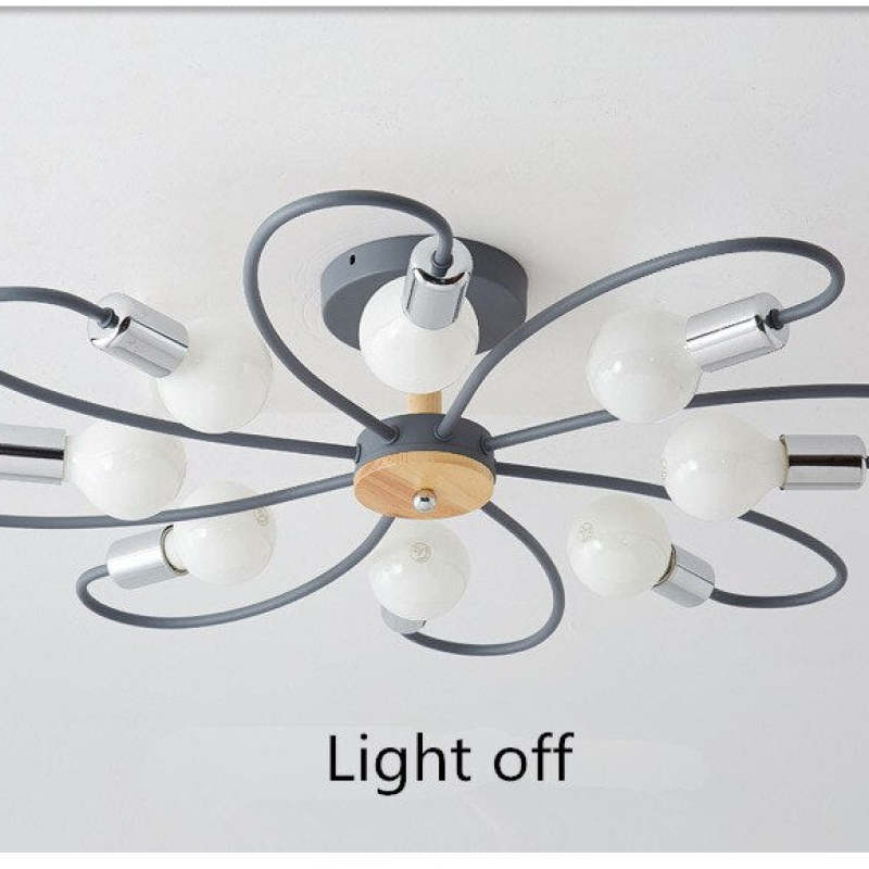 Gray eight-head flower ceiling light switched off, showing looped arms, white bulbs and round canopy