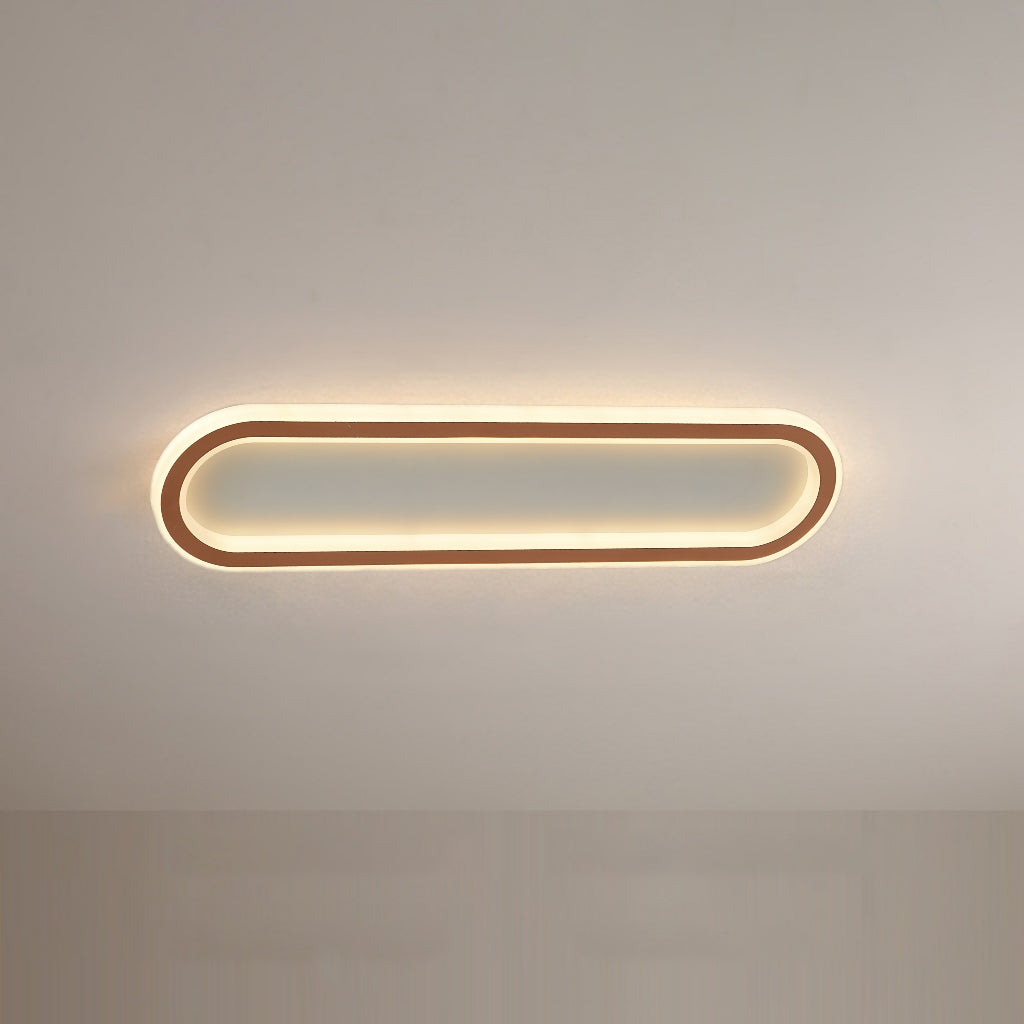 Rose Gold Quinn viewed from below with rounded rectangular outline, pale centre and warm-looking inner and outer borders.