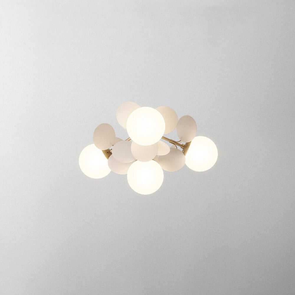 Jevon White 18.5-inch 4-light option seen from below, with lit white globes and pale oval petals.