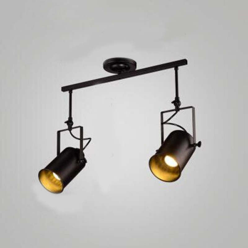 Alessio two-head black bar against pale backdrop, with lit angled spotlights, squared brackets and round canopy.