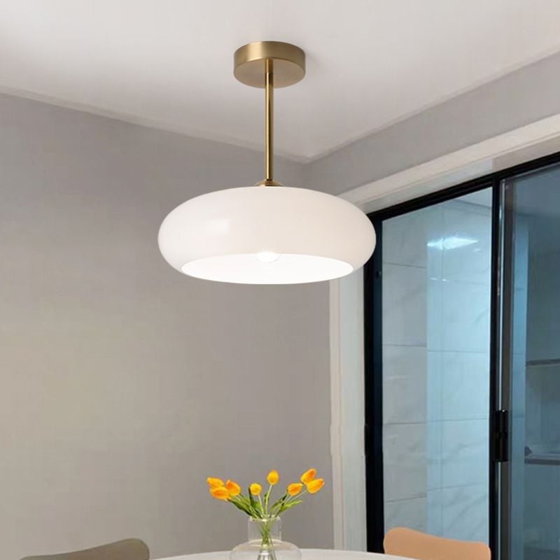White Hailie Style B stemmed ceiling light near a window