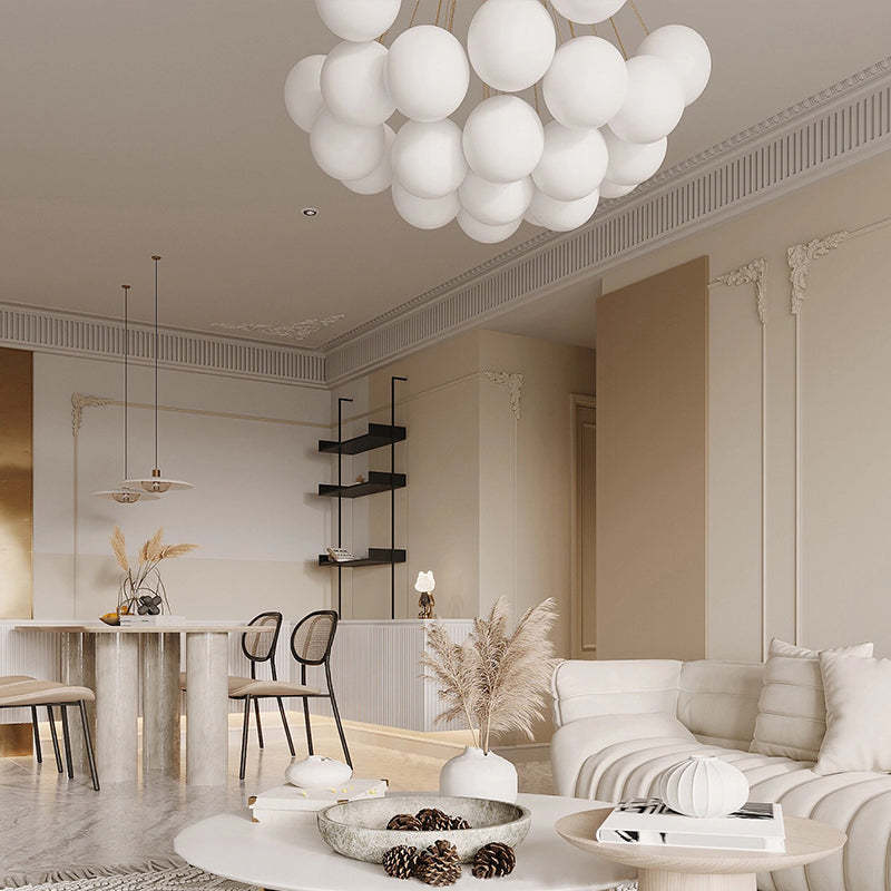 Underside of the white globe cluster above a living table