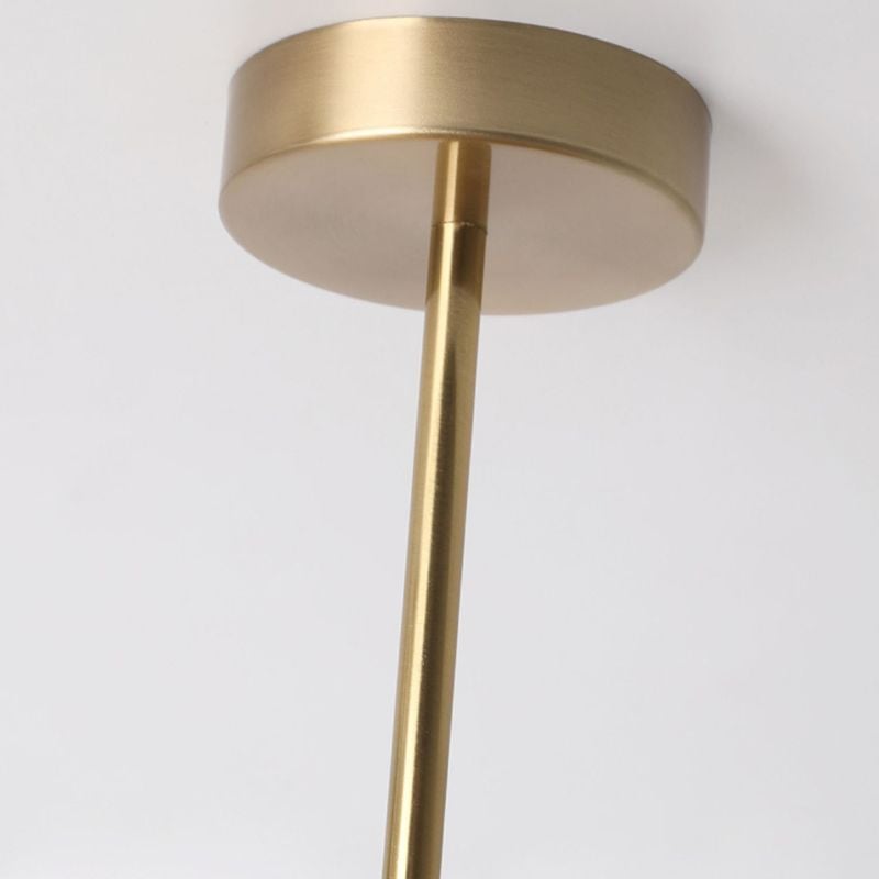 Close view of Hailie round gold-coloured canopy and straight stem