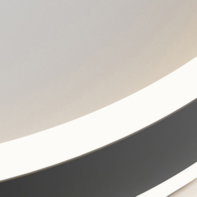 Black Quinn ceiling light showing white illuminated edge detail