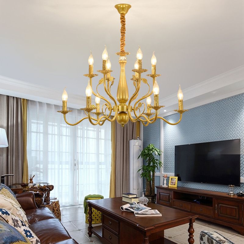 Gold 12-Light Marilyn in a living room with wood coffee table, brown sofa, TV cabinet and pale blue patterned wall.