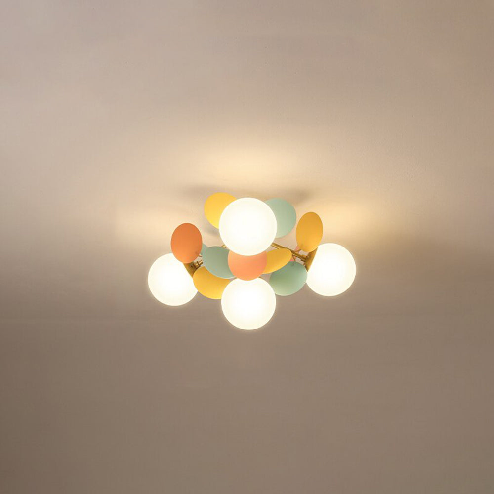 Jevon Color 18.5-inch 4-light option seen from below, with white globes and colourful oval petals.
