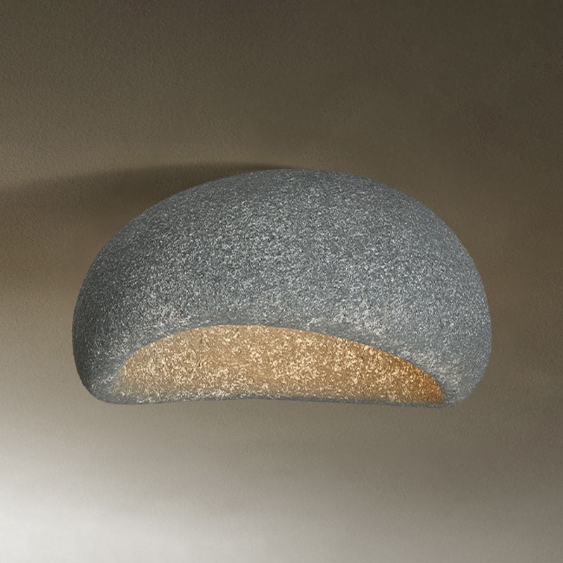 Dark gray Byers Standard view with a speckled rounded shell and a more symmetrical glowing curved opening.