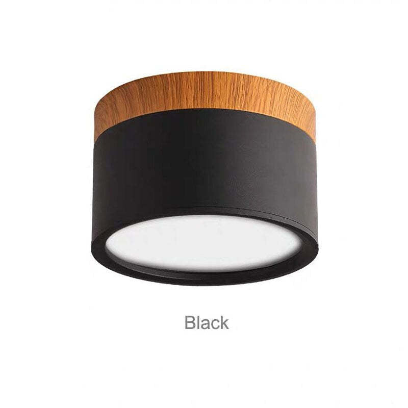 Black Morandi cylinder with wood-look upper band and pale circular diffuser, labeled Black on white backdrop.