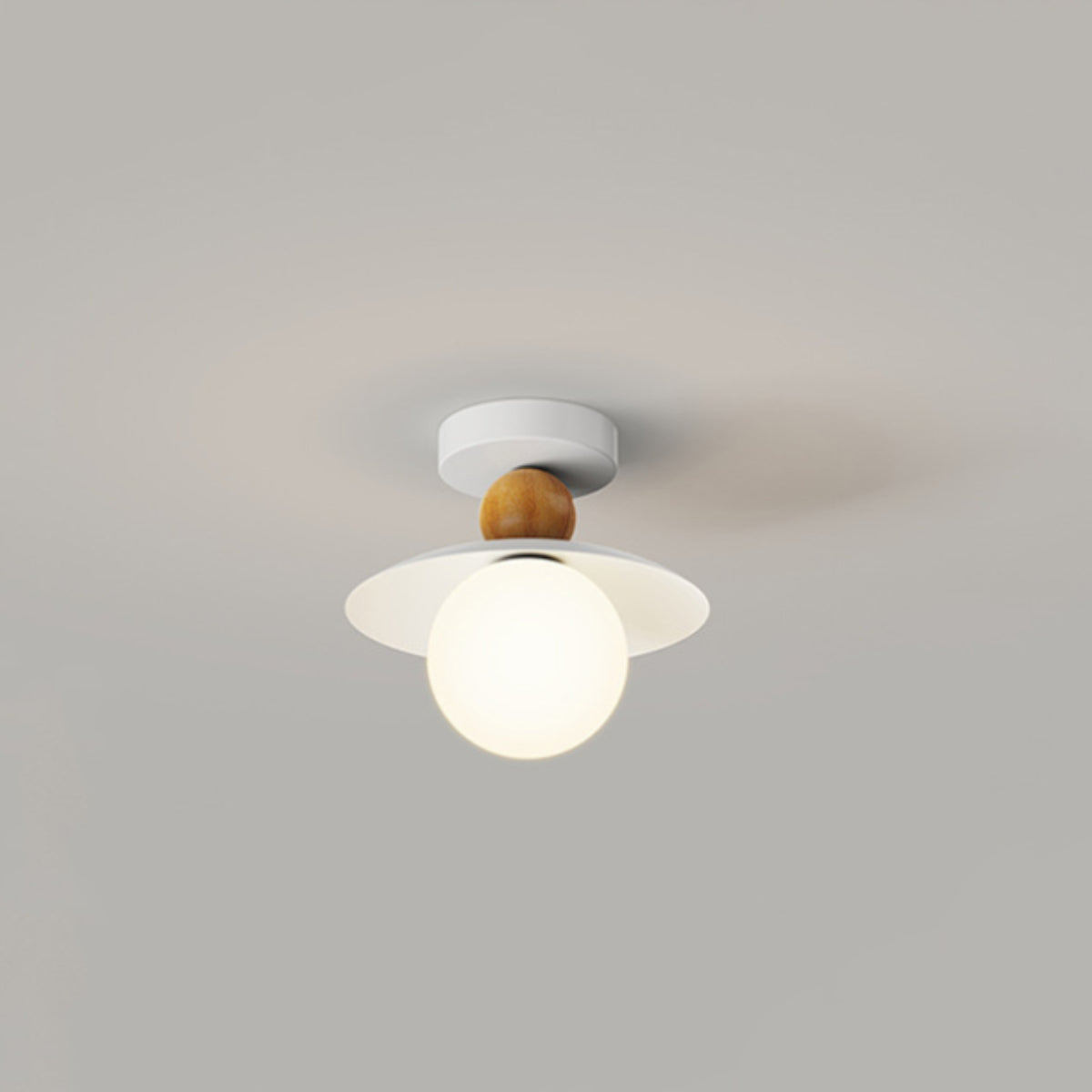 Hailie wood-tone ceiling light with a white globe and shallow disc shade