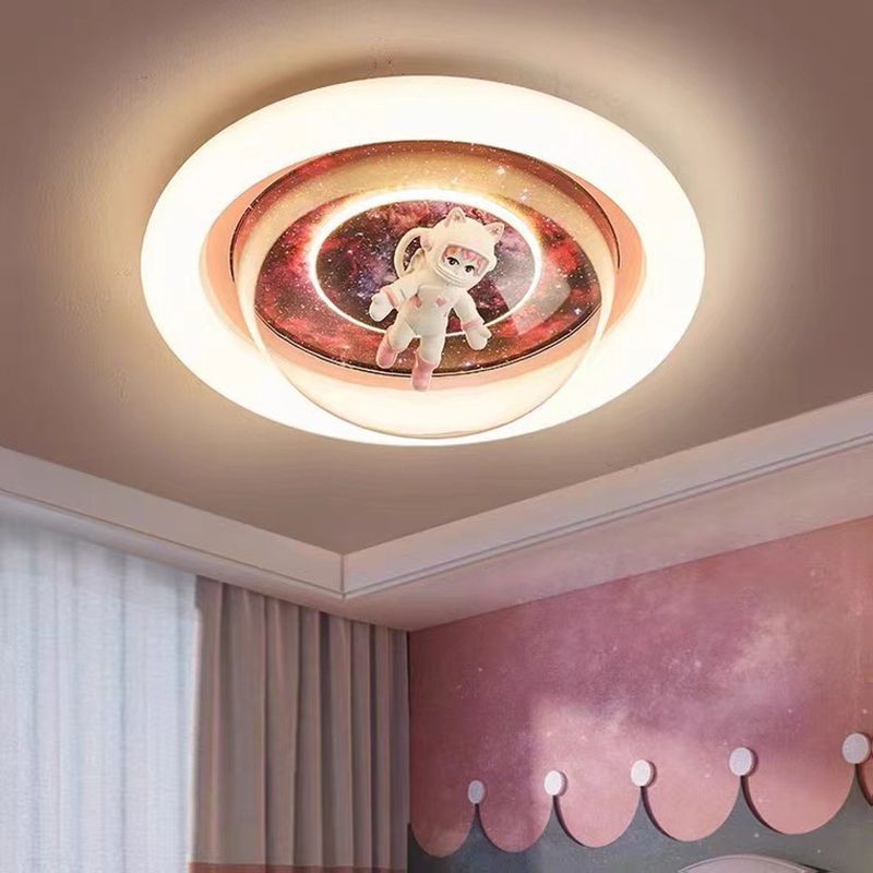 Pink Fateh astronaut ceiling light above a pink bedroom