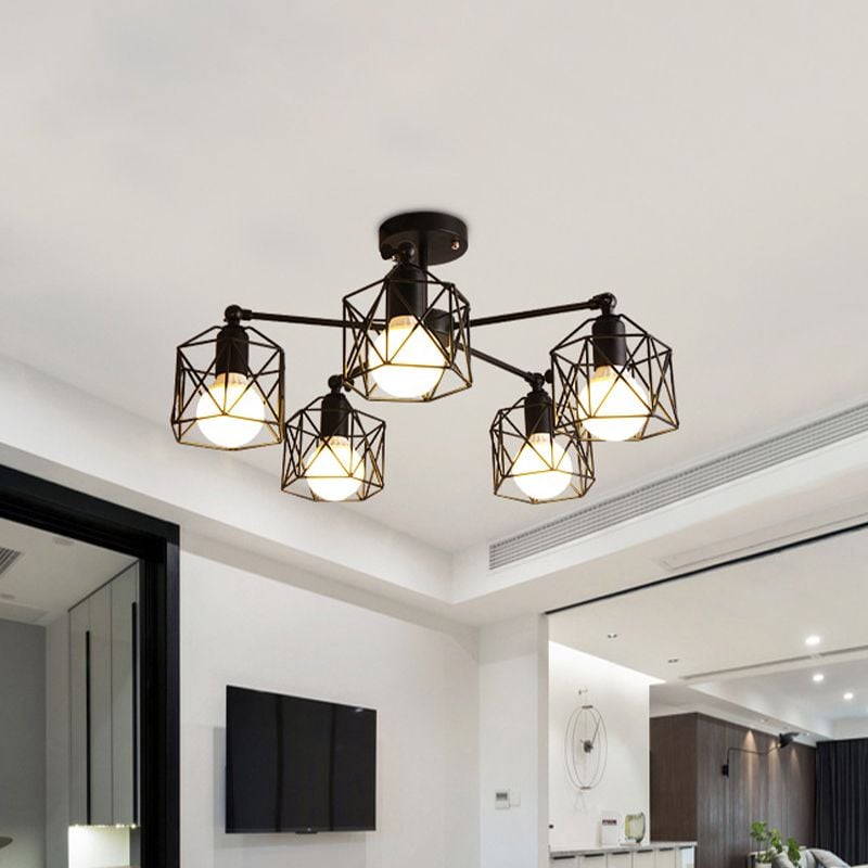 Five-light Herbert cage fitting above a TV wall, with a dark-framed opening, ceiling vent and view into a living area.