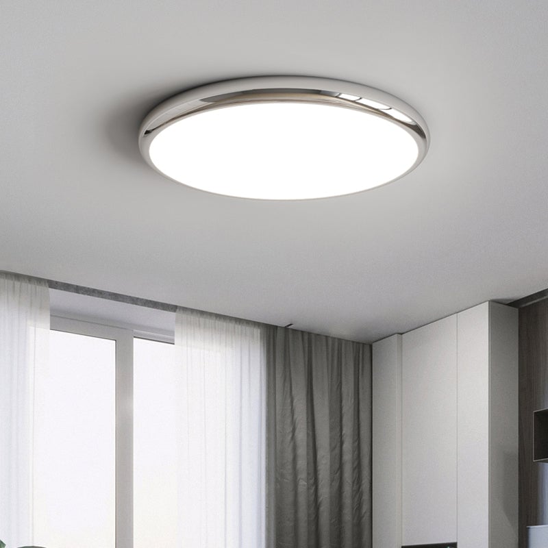 Ozawa silver-tone round ceiling light beside a bright window and curtains.