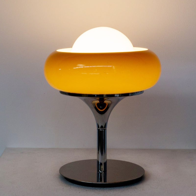 Close view of the table-lamp version and rounded orange glass shade