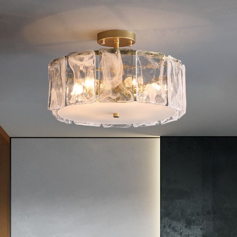 19.6-inch Kirsten option with a ring of patterned glass panels, above a pale panel beside a dark textured wall.