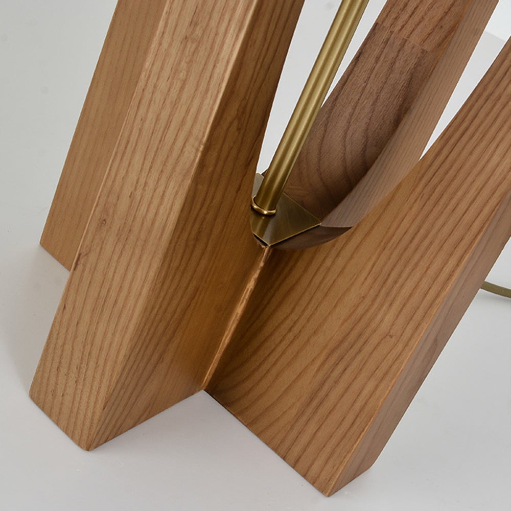 Close-up of Ozawa curved lower wooden panels and gold-tone central stem attached to a small metal bracket