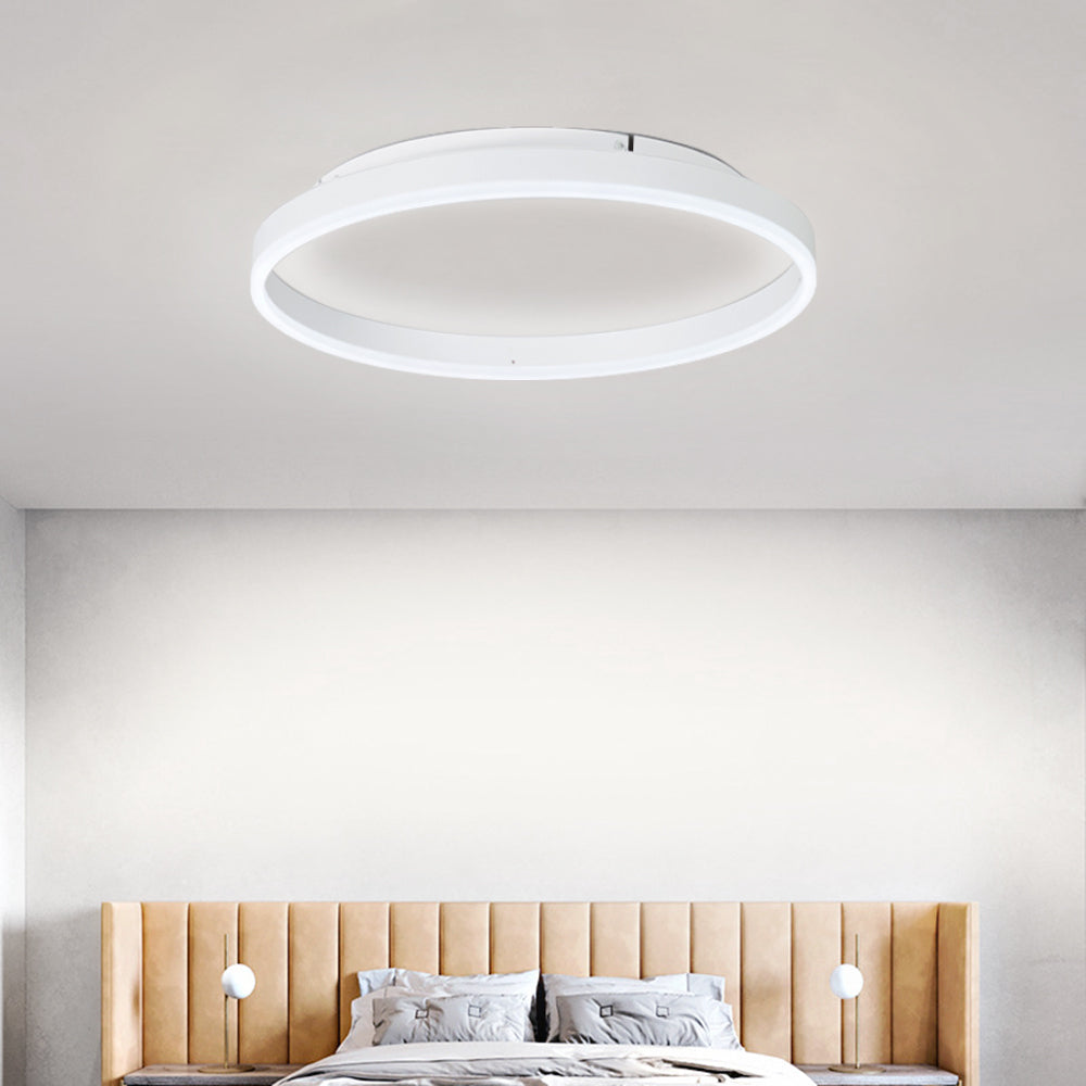 White Arisha above a bed with vertical tan headboard panels and two separate small globe bedside lights.