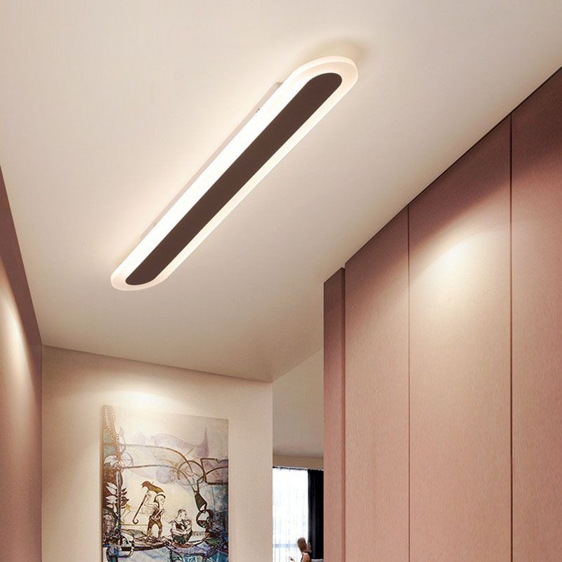 Coffee-colour Edge oval ceiling light above a hallway