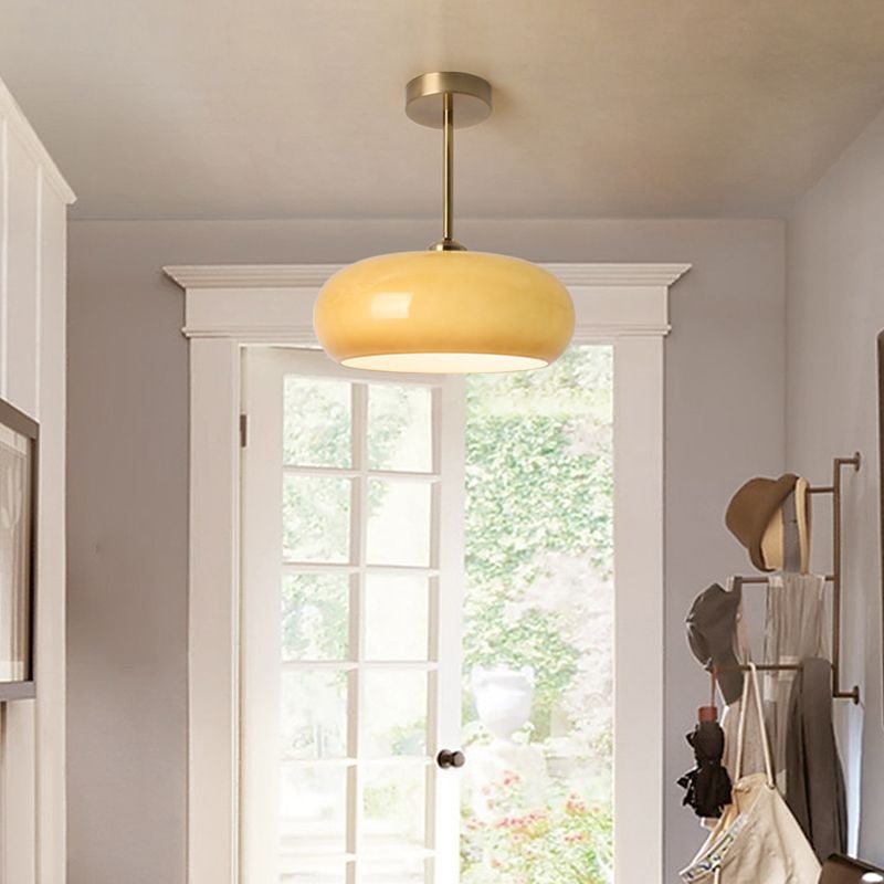 Orange Hailie Style B stemmed ceiling light above an entryway