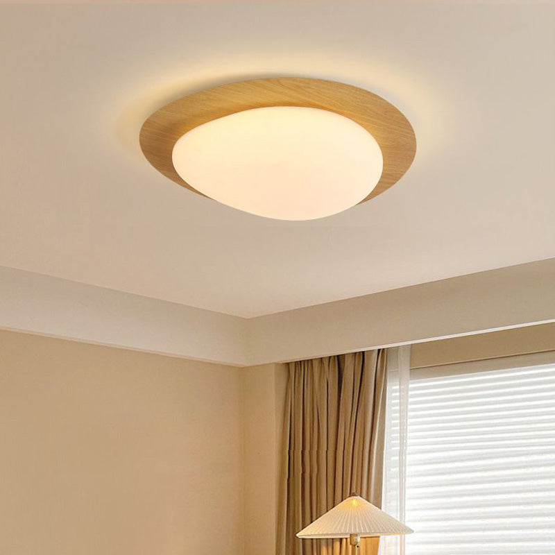 Large natural wood-effect Quinn ceiling light near curtains