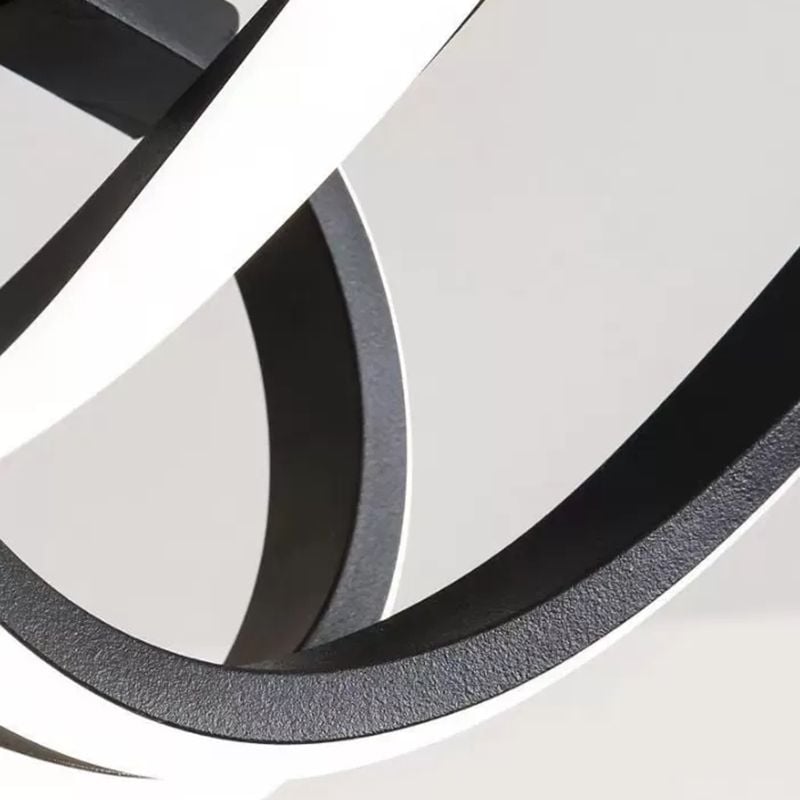 Close view of Lacey textured black curved frame and white diffuser