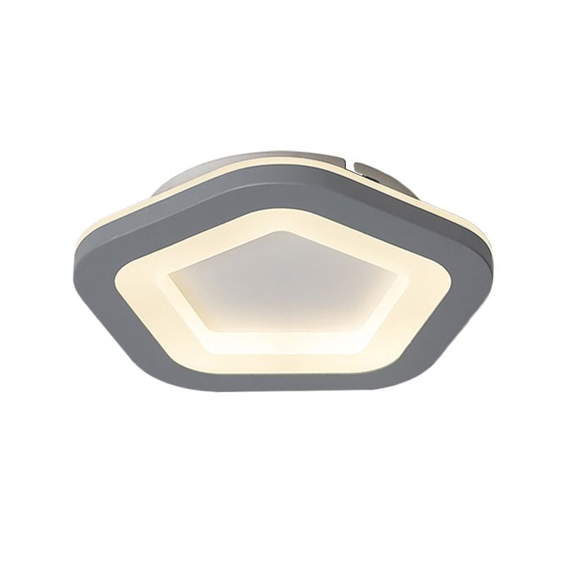 Close rounded pentagon gray border around a yellow-lit outline and pale inset center