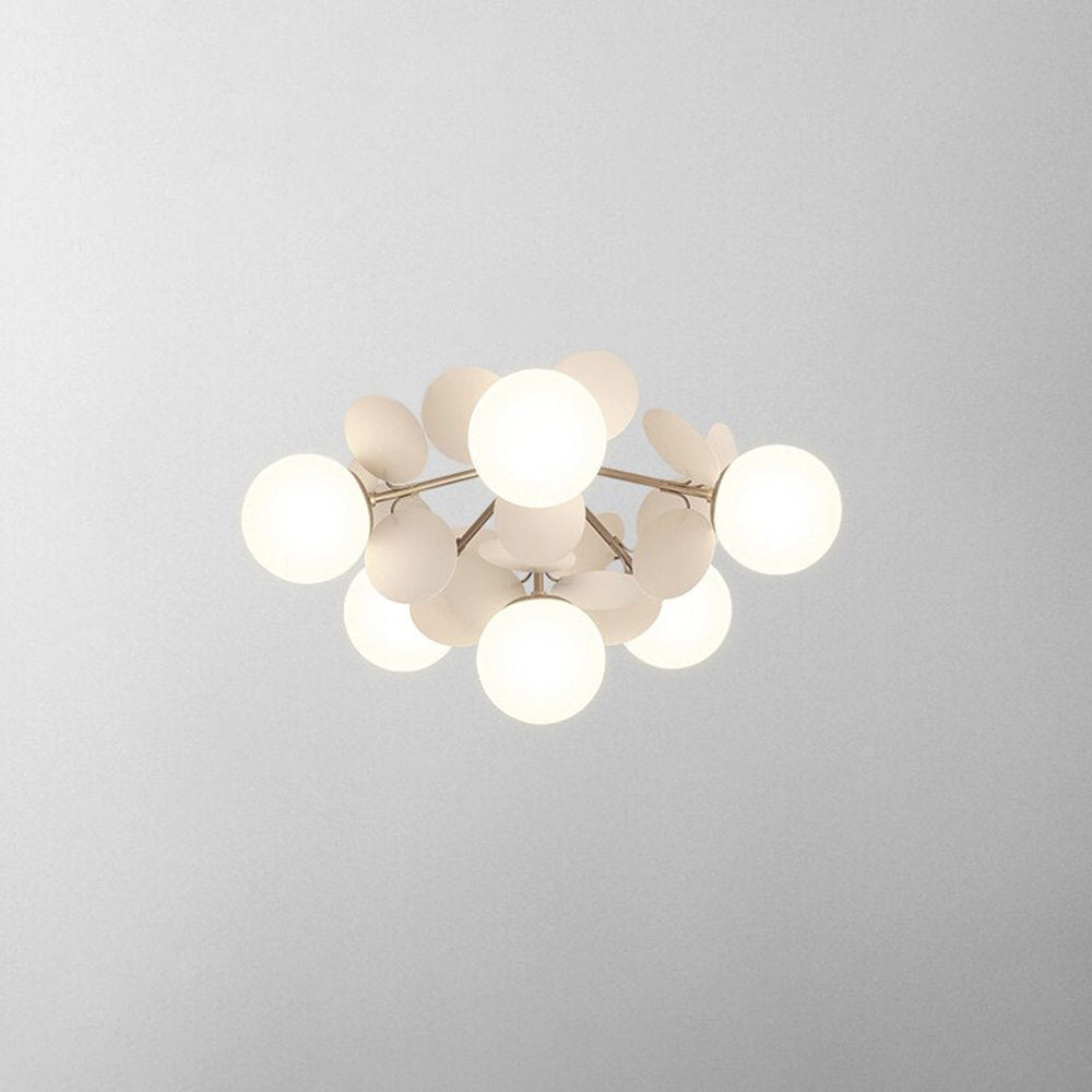 Jevon White 21.6-inch 6-light option viewed from below, with white globes and pale petals on gold-tone rods.
