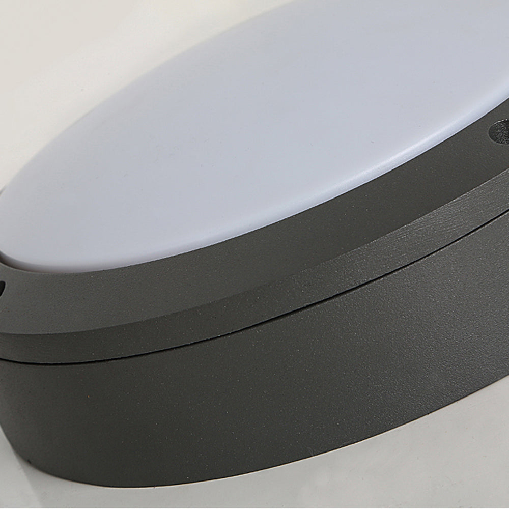 Orr round diffuser close-up showing a pale face, dark textured rim, housing seam and recessed edge screw.