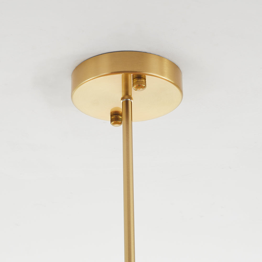 Round gold-coloured ceiling canopy and rod connection