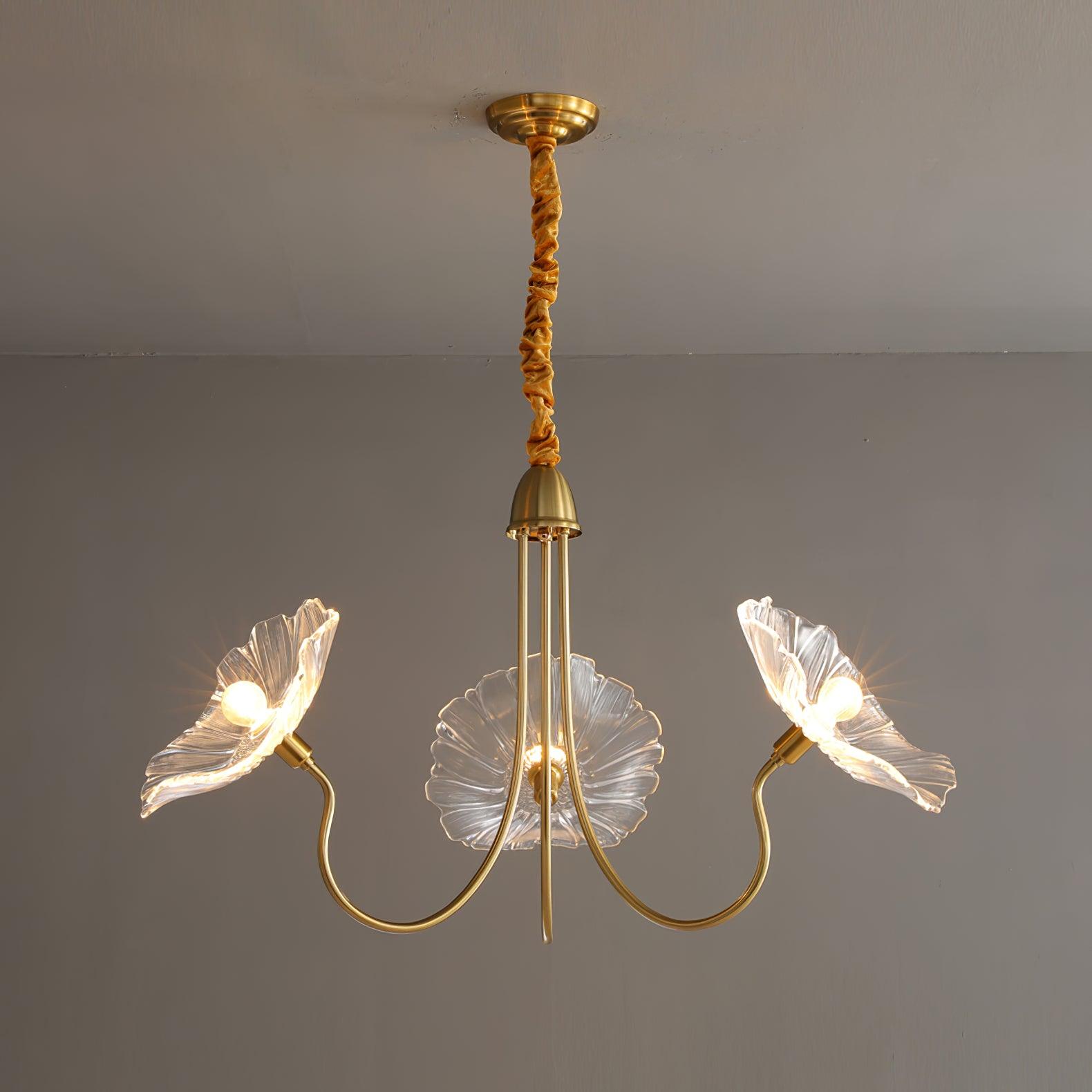 Clear three-head chandelier illuminated