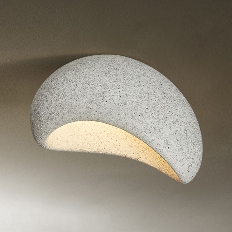 Light gray Byers Bevel Connection view with a speckled shell, sloping curved opening and deeper end.