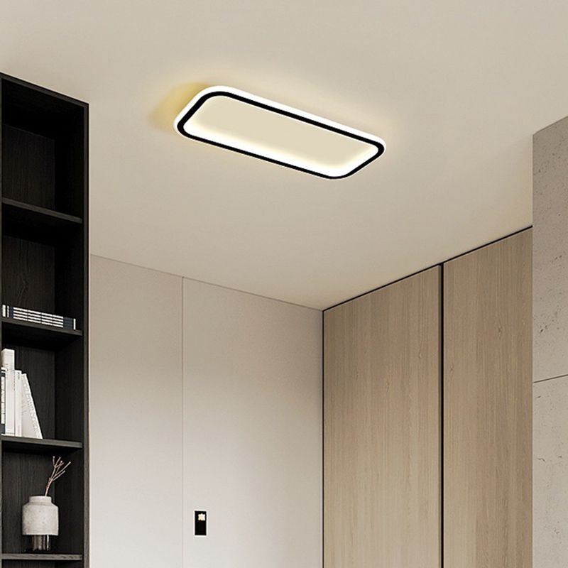 Edge ceiling fixture above a room with wood cabinetry